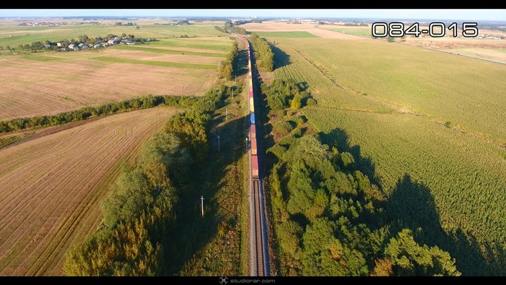 Cargo train transporting wagons – Drone Aerial Photography, Videography Servic...