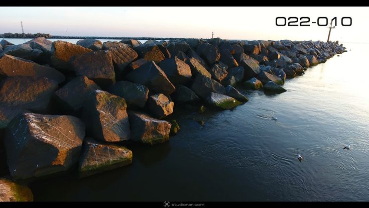 Sea breakwater from above – Drone Aerial Photography, Videography Services & V...