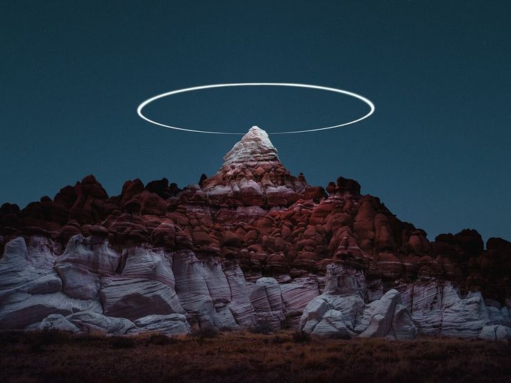 Long Exposure Photos Capture Drones “Painting” Light Halos Over Mountains Ch...