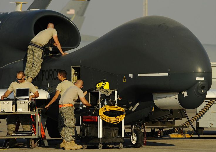 U.S. Airmen with the 380th Expeditionary Aircraft Maintenance Squadron prepare a...