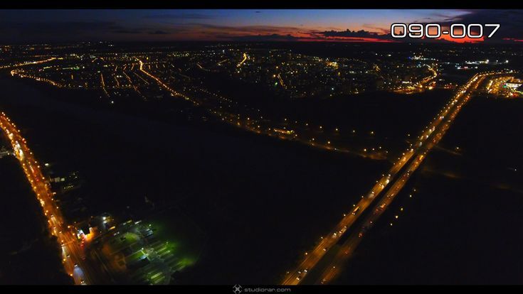 Aerial photography drone : Night illuminated highway of rolling city streets and...