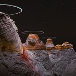 Long Exposure Photos Capture the Light Paths of Drones Above Mountainous Landsca...
