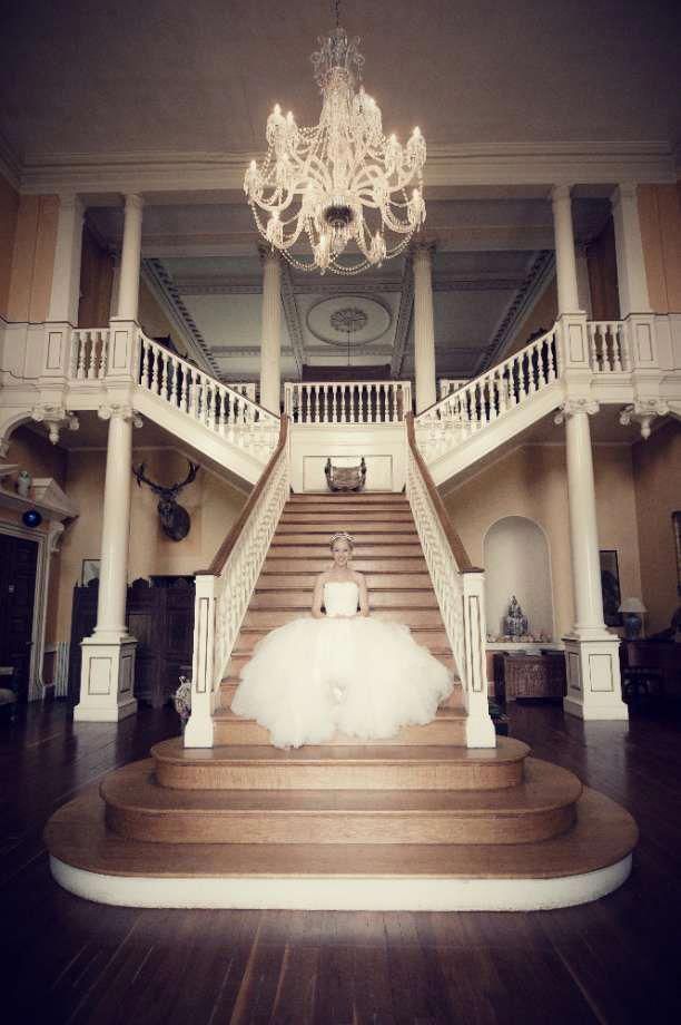 Entrance Hall and grand staircase at country house wedding venue Kimberley Hall in Norfolk #dronephotographyideaspeople
