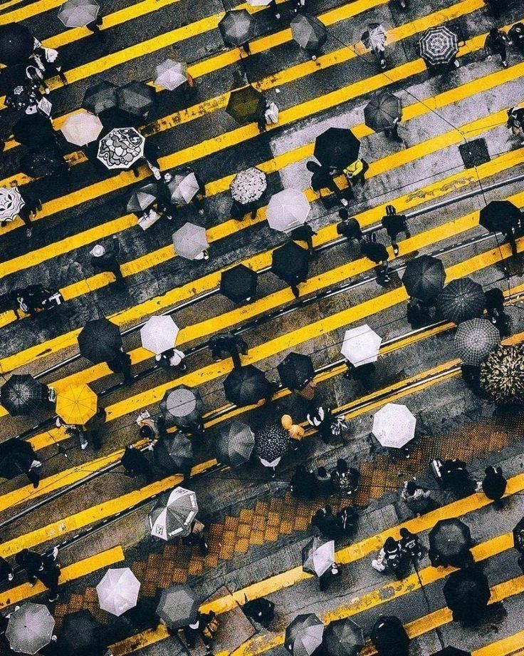 Landscape Drone Photography : On the streets. Rainy day in the city. Black and white. Umbrellas. People. Rush #blackandwhitepeoplephotography
