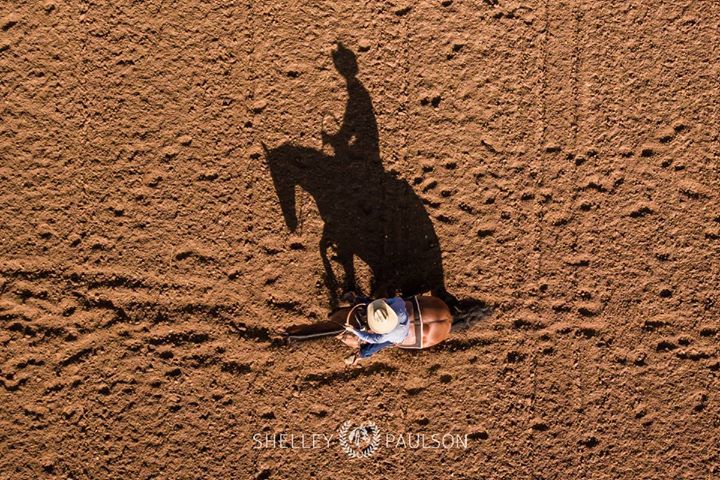 Sliding stop from above! I enjoy playing with shadows when I'm photographing with my drone. I have some ideas of other equestrian sports I could shoot this way but I would love to hear some of yours! - Photo by Shelley Paulson