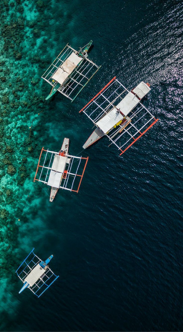 People Drone Photography : Drone views of boats in the Philippines. This collection of drone photos of the